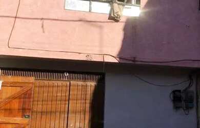 Imagem: A casa possui 2 Dormitórios, 2 Banheiros e 1 Vaga na garagem