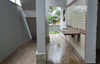 Imagem: A casa possui 2 Dormitórios, 4 Banheiros, 3 Vagas na garagem