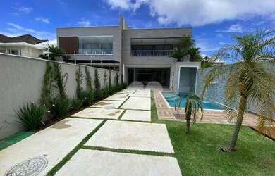 Imagem: A casa em condomínio possui 4 Dormitórios, 5 Banheiros, 3