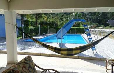 Imagem: A casa em condomínio possui 5 Dormitórios, 5 Banheiros, 5