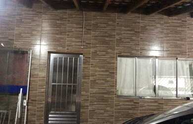 Imagem: A casa possui 5 Dormitórios, 4 Banheiros, 5 Vagas na garagem