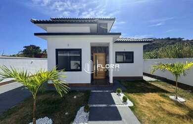 Imagem: A casa possui 3 Dormitórios, 2 Banheiros, 3 Vagas na garagem