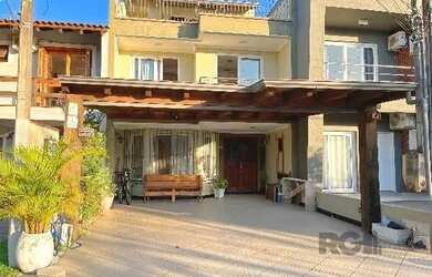 Imagem 3: Casa em Porto Alegre, no bairro Hípica, com 3 dormitório s , e 3 banheiros,...