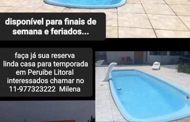 Imagem: A casa possui 2 Dormitórios, Acomodam 13 pessoas, 4 Vagas na