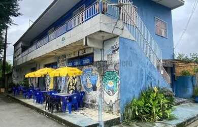 Imagem: A casa possui 2 Dormitórios, 4 Banheiros, 1 Vaga na garagem