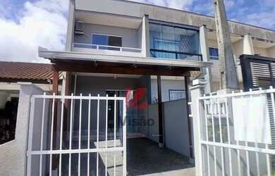 Imagem: A casa possui 2 Dormitórios, 2 Banheiros, 1 Vaga na garagem