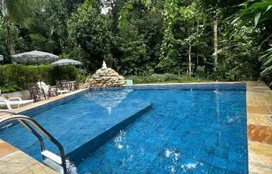 Imagem: A casa em condomínio possui 4 Dormitórios, 4 Banheiros, 2