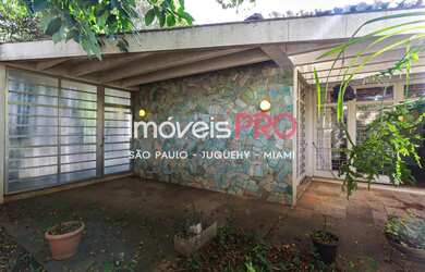 Imagem: A casa possui 3 Dormitórios, 3 Banheiros, 5 Vagas na garagem