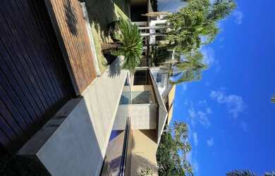 Imagem: A casa em condomínio possui 4 Dormitórios, 5 Banheiros, 3