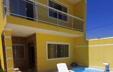 Imagem: A casa possui 4 Dormitórios, 1 Vaga na garagem e está localizado