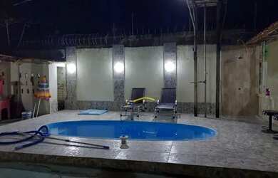 Imagem: A casa possui 2 Dormitórios, 3 Banheiros, 2 Vagas na garagem