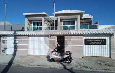 Imagem: A casa possui 4 Dormitórios, 2 Banheiros, 2 Vagas na garagem