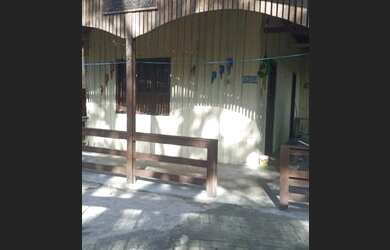 Imagem: A casa possui 1 Dormitório, 3 Vagas na garagem e está localizado