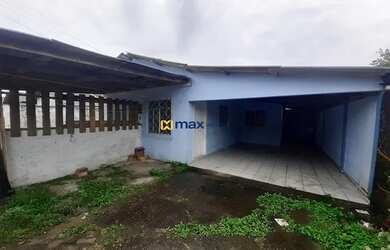 Imagem: A casa possui 2 Dormitórios, 1 Banheiro, 1 Vaga na garagem