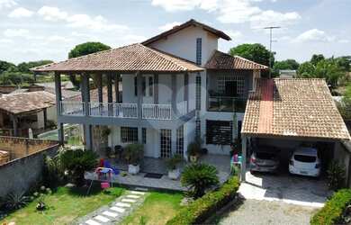 Imagem: A casa possui 3 Dormitórios, 4 Banheiros, 4 Vagas na garagem