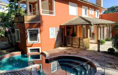 Imagem: A casa em condomínio possui 4 Dormitórios, 5 Banheiros, 5