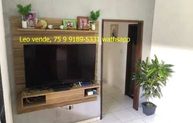 Imagem: A casa possui 3 Dormitórios, 2 Banheiros, 2 Vagas na garagem