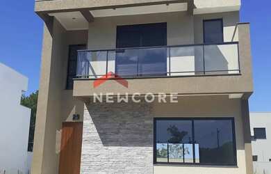 Imagem: A casa possui 3 Dormitórios, 3 Banheiros, 2 Vagas na garagem