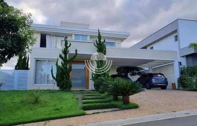 Imagem: A casa em condomínio possui 4 Dormitórios, 5 Banheiros, 4