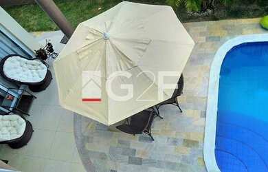 Imagem 14: Casa Swiss Park. Piscina, Churrasqueira, VarandaeGuarda roupa