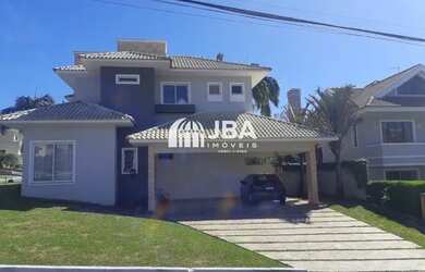 Imagem: A casa em condomínio possui 4 Dormitórios, 4 Banheiros, 5