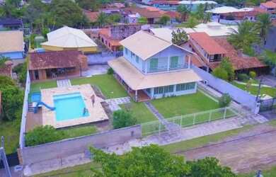 Imagem: A casa para temporada possui 5 Dormitórios e 4 Vagas na garagem