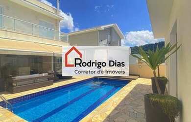 Imagem: A casa em condomínio possui 5 Dormitórios, 5 Banheiros, 3