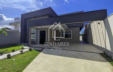 Imagem: A casa possui 3 Dormitórios, 3 Banheiros, 3 Vagas na garagem