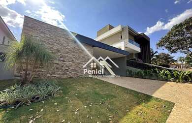 Imagem: A casa em condomínio possui 3 Dormitórios, 5 Banheiros, 4