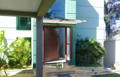 Imagem: A casa possui 3 Dormitórios, 5 Banheiros, 3 Vagas na garagem