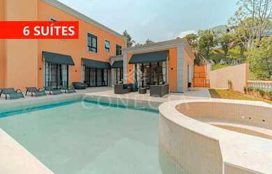 Imagem: A casa possui 5 Dormitórios, 5 Banheiros, 5 Vagas na garagem