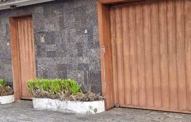 Imagem: A casa possui 3 Dormitórios, 5 Banheiros, 5 Vagas na garagem