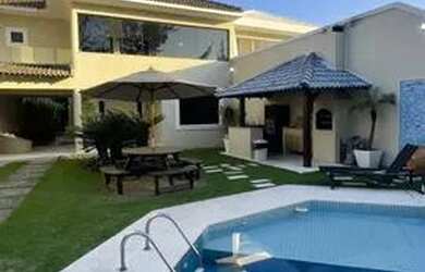 Imagem: A casa em condomínio possui 4 Dormitórios, 4 Banheiros, 2