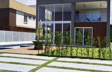 Imagem: A casa em condomínio possui 5 Dormitórios, 5 Banheiros, 391m²