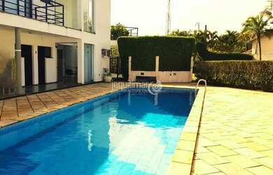 Imagem: A casa em condomínio possui 4 Dormitórios, 5 Banheiros, 4