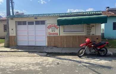 Imagem: A casa possui 2 Dormitórios, 1 Banheiro, 1 Vaga na garagem
