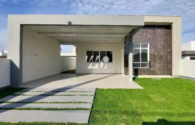 Imagem: A casa possui 3 Dormitórios, 2 Banheiros, 2 Vagas na garagem