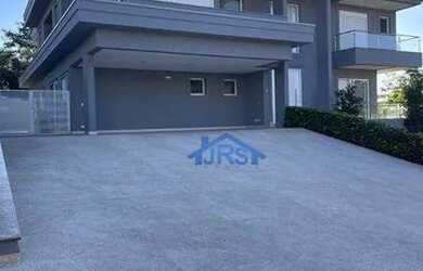 Imagem: A casa em condomínio possui 4 Dormitórios, 4 Banheiros, 5