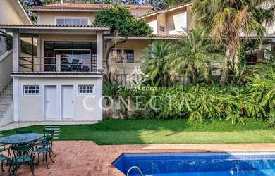 Imagem: A casa possui 4 Dormitórios, 3 Banheiros, 3 Vagas na garagem