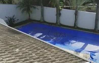 Imagem: A casa em condomínio possui 4 Dormitórios, 5 Banheiros, 4