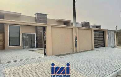 Imagem: A casa possui 3 Dormitórios, 2 Banheiros, 2 Vagas na garagem