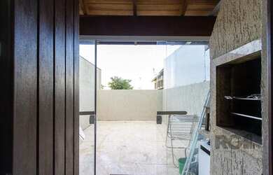 Imagem 11: Casa em Hípica. Churrasqueira, Lareira, 1 Vaga na garageme3 Dormitórios