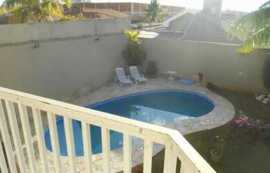 Imagem: A casa possui 5 Dormitórios, 5 Banheiros, 5 Vagas na garagem