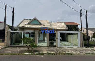 Imagem: A casa possui 3 Dormitórios, 4 Banheiros, 2 Vagas na garagem