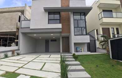 Imagem: A casa em condomínio possui 4 Dormitórios, 5 Banheiros, 2