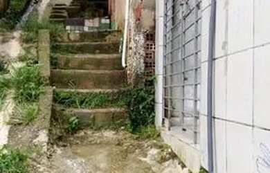 Imagem: A casa possui 2 Dormitórios e 1 Banheiro e está localizado