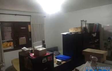 Imagem: A casa possui 3 Dormitórios, 5 Banheiros, 3 Vagas na garagem