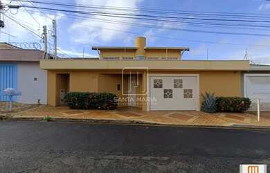 Imagem: A casa possui 3 Dormitórios, 5 Banheiros, 4 Vagas na garagem