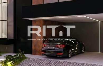 Imagem: A casa possui 3 Dormitórios, 2 Banheiros, 2 Vagas na garagem