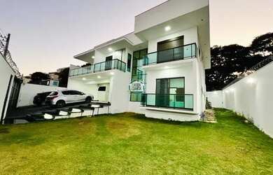 Imagem: A casa possui 5 Dormitórios, 5 Banheiros, 5 Vagas na garagem